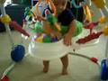 Playing in his activity center 5 1/2 months