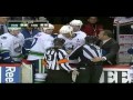 Canucks' Rypien trin to attack a Wild fan
