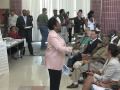 Is this town hall questioner a doctor, as claimed, or an OFA organizer / Obama delegate?