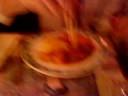 Eating Chinese food with sticks