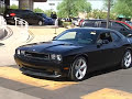 Jay Leno and Craig Jackson pick up their Dodge Challengers
