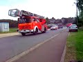 Défilé de camions de pompiers