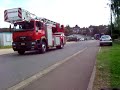 Défilé de camions de pompiers