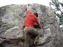 Pierre-Alain takes a boulder