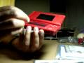 This is the unboxing of my brand new factory sealed Nintendo Ds lite MARIO red special edition. For 150$ without taxes i got it at a best just before they got out of stock, i got a big annoying to open box which features the system and the NEW SUPER MARIO BROS CARTRIDGE GAME. very good deal and a very very very nice red glossy DS