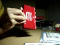 this is the unboxing of my brand new factory sealed nintendo ds lite mario red special edition. for 150$ without taxes i got it at a best just before they got out of stock, i got a big annoying to open box which features the system and the new super mario bros cartridge game. very good deal and a very very very nice red glossy ds
