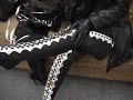 Teri laces up her black and silver leather boots. Teri laces up her black and silver leather boots.