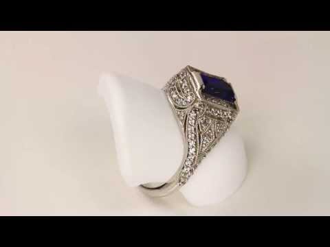 Antique Highly Detailed Ring with Emerald Cut Tanzanite