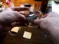 A beginners entry level tutorial of how to make a Leyden jar out of Metal Foil and a Petri Dish in less then ten seconds. Lesson 101 in capacitor construction for beginners; once you have made a few, the concept seems simple; but everyone starts someplace. In the single plate form it is more of a Franklin Square but functions exactly the same. Charging with a negative ion generator is shown and several small sparks. Oh and me being zapped...like what else is new?
