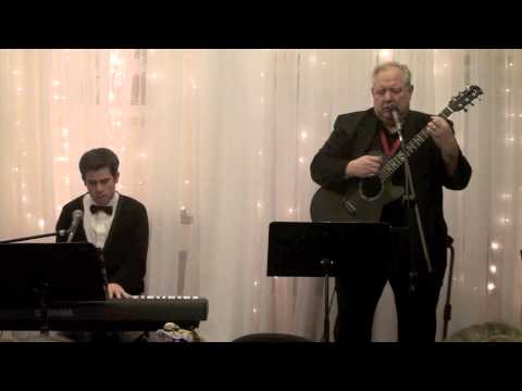 NelsonsMusic1 - Bob Nelson & Spencer Schmidt provide the entertainment at the 3rd Ward RS Dinner.