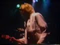 Footage of Nirvana playing the song School on the European tour of 1991 with Sonic Youth.