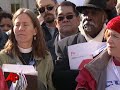 Raw Video: Praying for a Financial Solution Raw Video: Praying for a Financial Solution