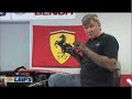 on day two of the repair of a ferrari 360 spider, leif pulls its engine out.