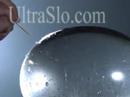 Busted water balloon in slow motion