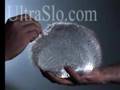 Busted water balloon in slow motion