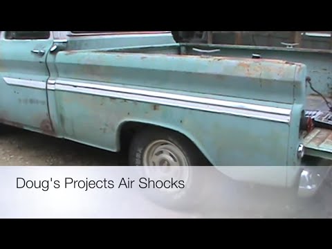 Replacing the rear shocks with air shocks on a Chevy C10 Truck