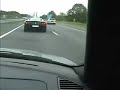 Ferrari meets BMW 740i on highway Ferrari meets BMW 740i on highway
