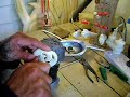 carving a New Zealand maori whale bone pendant