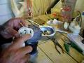 carving a New Zealand maori whale bone pendant