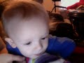 Azariah playing with a sock monster