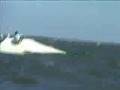Sailing dinghy capsizes
