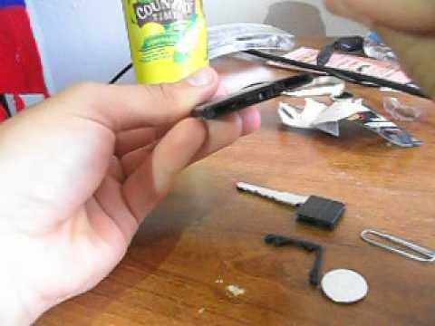 How to Change battery on the slim key-less remote control for  for Mazda CX-7