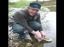 Two friends, after some good times on river, release a incredible white trout.