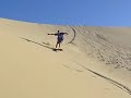 sandboard surfing dune