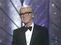 cary grant presenting an honorary oscar� to james stewart(