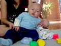 Baby trying to sit.
