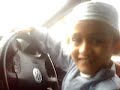 8 year old kid driving in car park