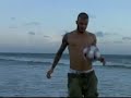 Topless David Beckham in beach keepy uppies!