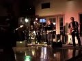 the ed maly band at the houstonian golf & country club playing at the 2006 initiation party for the rosenberg-richmond area chamber of commerce.  musicians include don irby on bass, keith cannon on guitar, and mike snelling on drums.