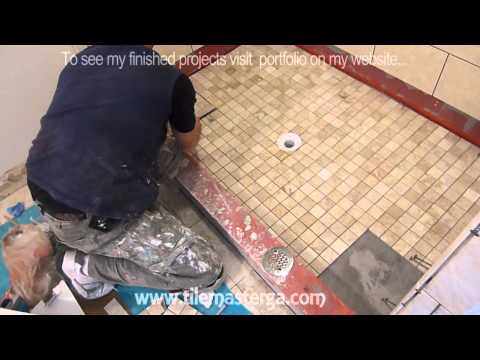 shower - (Part 4)This clip includes shower floor mud and shower floor tiles installation, cutting tiles around drain in walk-in shower - how to build shower step by s...