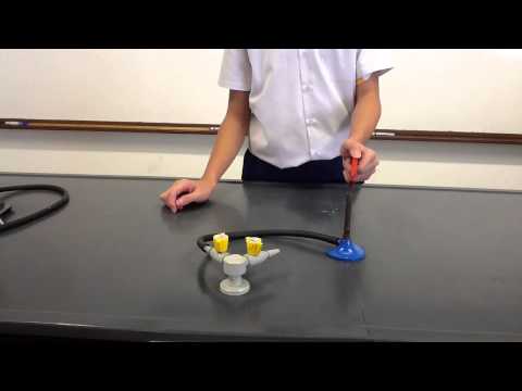 how to properly ignite a bunsen burner