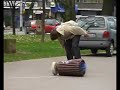 4 garbage cans, one bag and the box