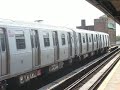 R68 D train leaves station with a suprise train! R68 D train leaves station with a suprise train!