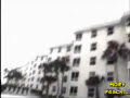 Guy Tries to Jump Off a Roof into a Pool and Misses
