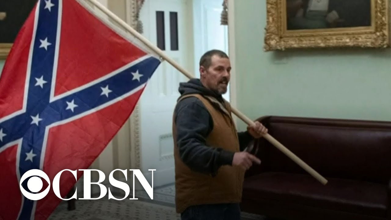 The Confederate battle flag, which rioters flew inside the US Capitol, has long been a symbol of white insurrection