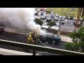 Slow Motion: www.youtube.com It happened in front of my apartment today. 5353 Wilshire Blvd at beginning of Detroit Street Los Angeles California. Car exploded and burst into flames and brave fire fighters arrived on time. I didn't know what to do with the video maybe I should call news or something share your ideas with me please.
