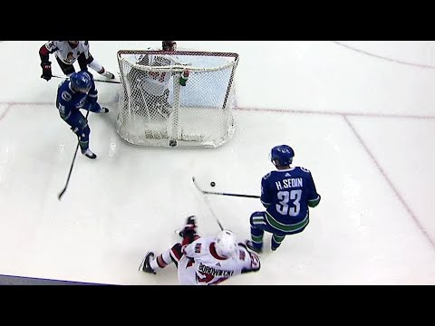 Video: Henrik plays puck to himself behind net, Tanev finds back of net