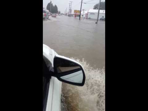 farmington - Heavy rainfall in Farminton,NM flooded the streets of town today.