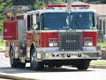 Fire Ground Scene - Apparatus and Firefighters Fire Ground Scene - Apparatus and Firefighters