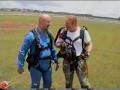 watch closely when the camera man's parachute gets tangled and he almost has to cut away or bounce during my video!