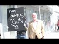 Scientology employs man with a gun to watch Anonymous?