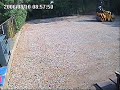 Asphalt paver falls in a sinkhole