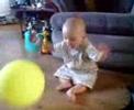 Riley amused by balloon Riley amused by balloon