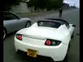 Tesla Roadster vs. Porsche 911 Carrera Cabriolet (996?)