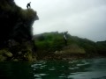 George & Steve jumping off the cliff in Archirondel George & Steve jumping off the cliff in Archirondel