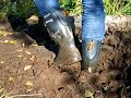 Wellies and white Nike tube socks vs deep mud